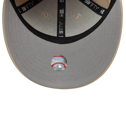Pictured is this MLB College Varsity New York Yankees Low Profile 59FIFTY Fitted cap in beige. 2
