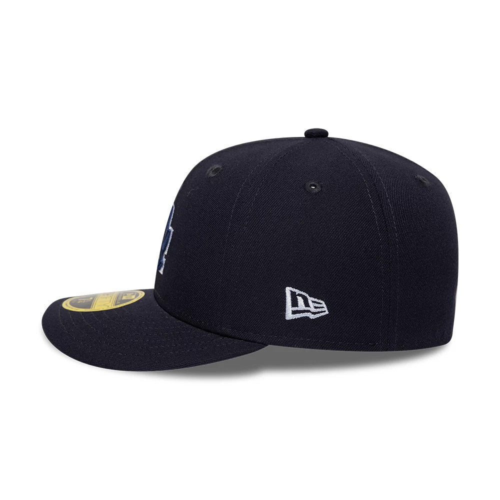 Pictured is this MLB College Varsity LA Dodgers Low Profile 59FIFTY Fitted cap in navy. 5