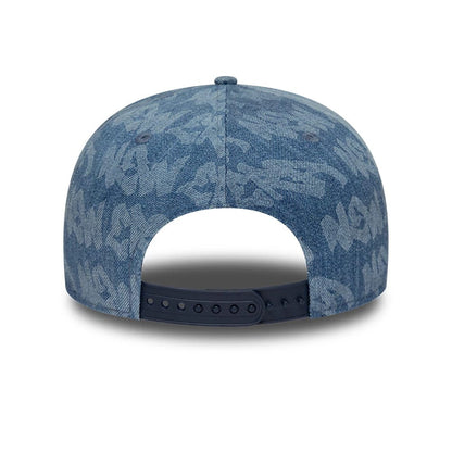 Pictured is this New Era Laser Burnout Washed Denim 9FIFTY Snapback Adjustable cap in navy. 7