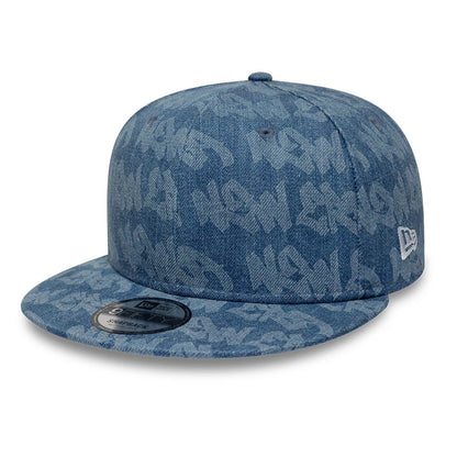 Pictured is this New Era Laser Burnout Washed Denim 9FIFTY Snapback Adjustable cap in navy. 1