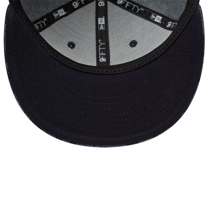 Pictured is this New Era Laser Burnout Denim 9FIFTY Snapback Adjustable cap in navy. 7