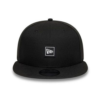 Pictured is this New Era Flag Patch 9FIFTY Snapback cap in black. 2