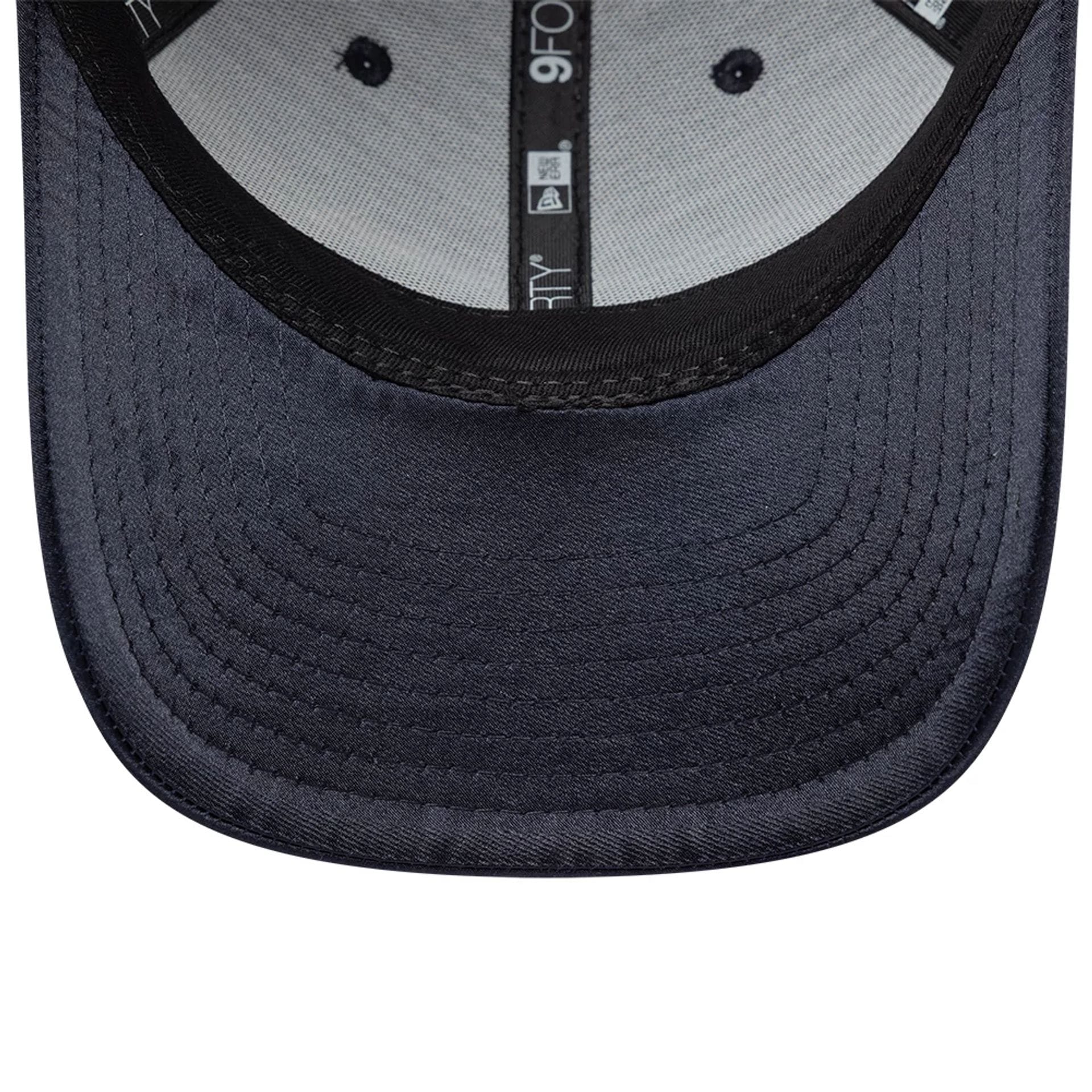 Pictured is this New Era Satin 9FORTY cap in navy. 5