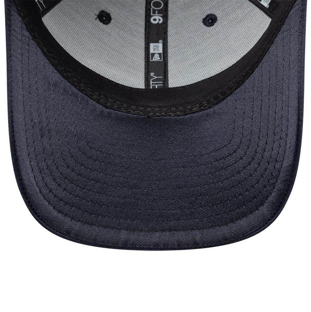 Pictured is this New Era Satin 9FORTY cap in navy. 5