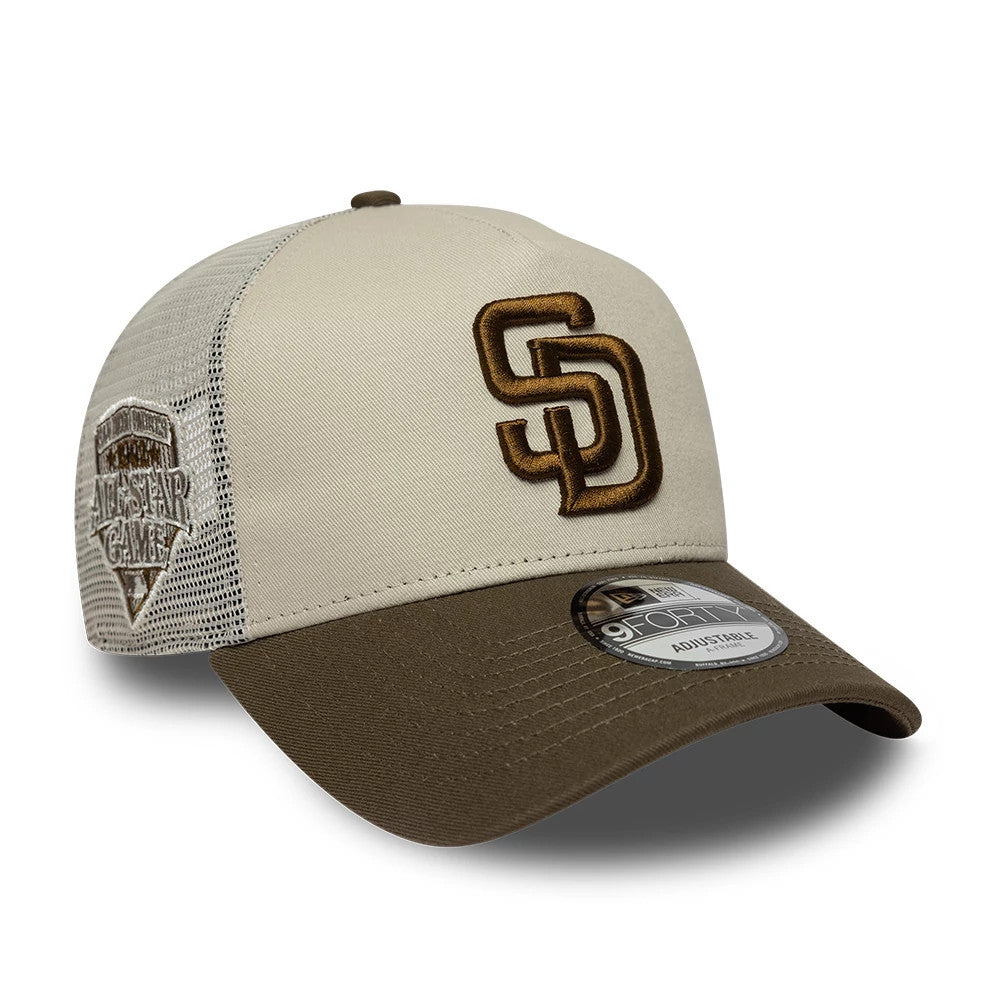 Pictured is this MLB Patch San Diego Padres 9FORTY A-Frame Trucker cap in light beige. 1