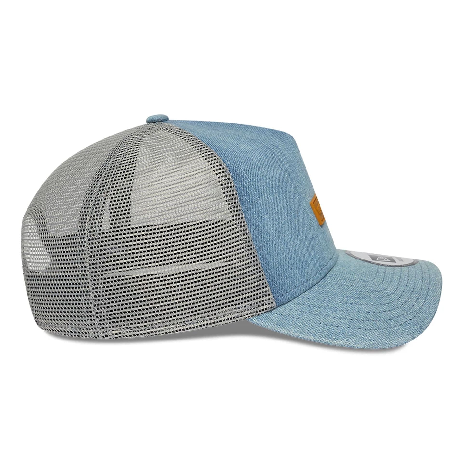 Pictured is this New Era Washed Denim 9FORTY A-Frame Trucker cap in navy. 7