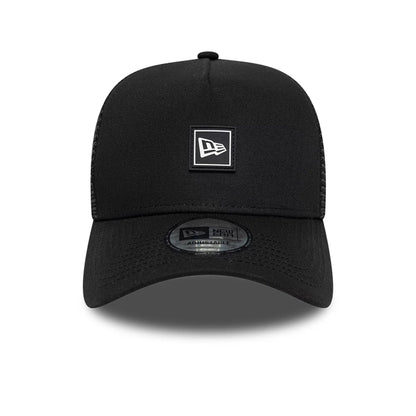 Pictured is this New Era Flag Patch 9FORTY A-Frame Trucker cap in black. 2