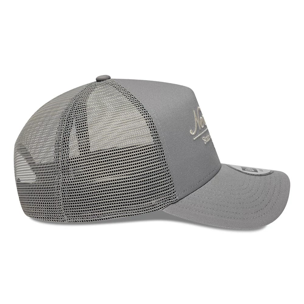 Pictured is this New Era Script 9FORTY A-Frame Trucker cap in grey. 5