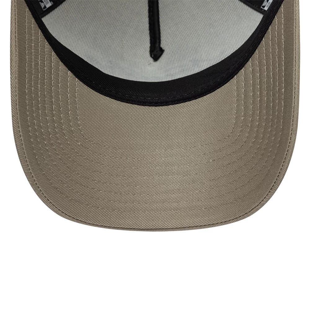 Pictured is this New Era Script 9FORTY A-Frame Trucker cap in cream. 7