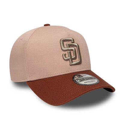 Pictured is this MLB Mocha Mousse San Diego Padres 9FORTY A-Frame Adjustable cap in pastel pink. 3