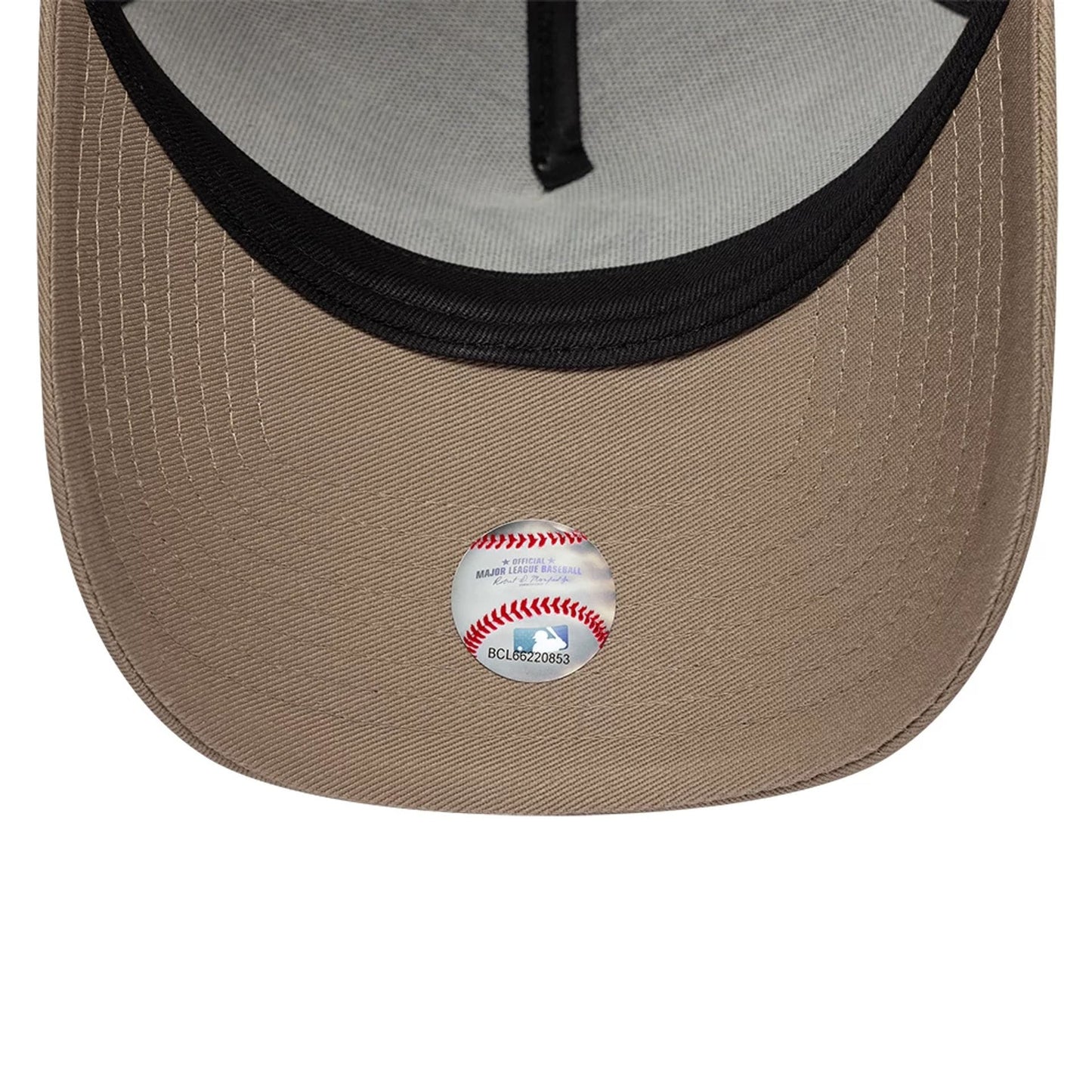 Pictured is this MLB Mocha Mousse New York Yankees 9FORTY A-Frame Adjustable cap in beige. 7