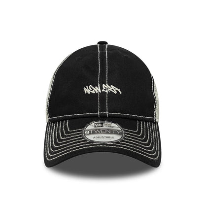 Pictured is this New Era Tagging Logo 9TWENTY Trucker cap in black. 2