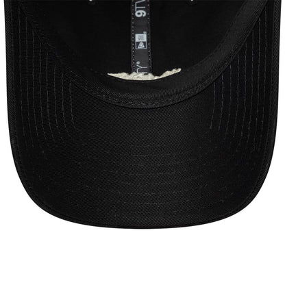 Pictured is this New Era Tagging Logo 9TWENTY Trucker cap in black. 7