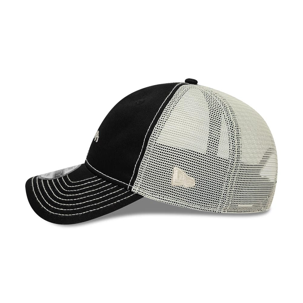 Pictured is this New Era Tagging Logo 9TWENTY Trucker cap in black. 4