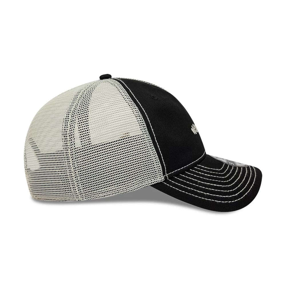 Pictured is this New Era Tagging Logo 9TWENTY Trucker cap in black. 5