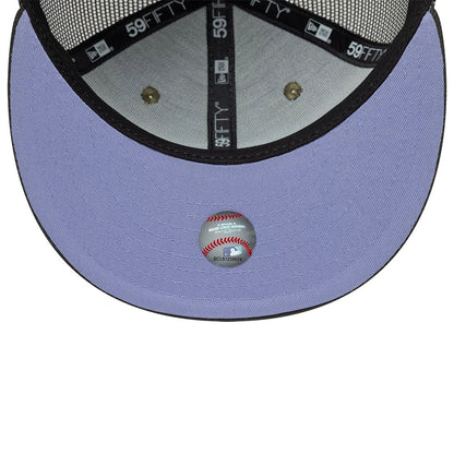 New York Yankees MLB Hydrangea Green New Era 59FIFTY Fitted Cap, inside view showing the light purple undervisor, Major League Baseball holographic sticker, and black taping with white 59FIFTY branding on the crown.