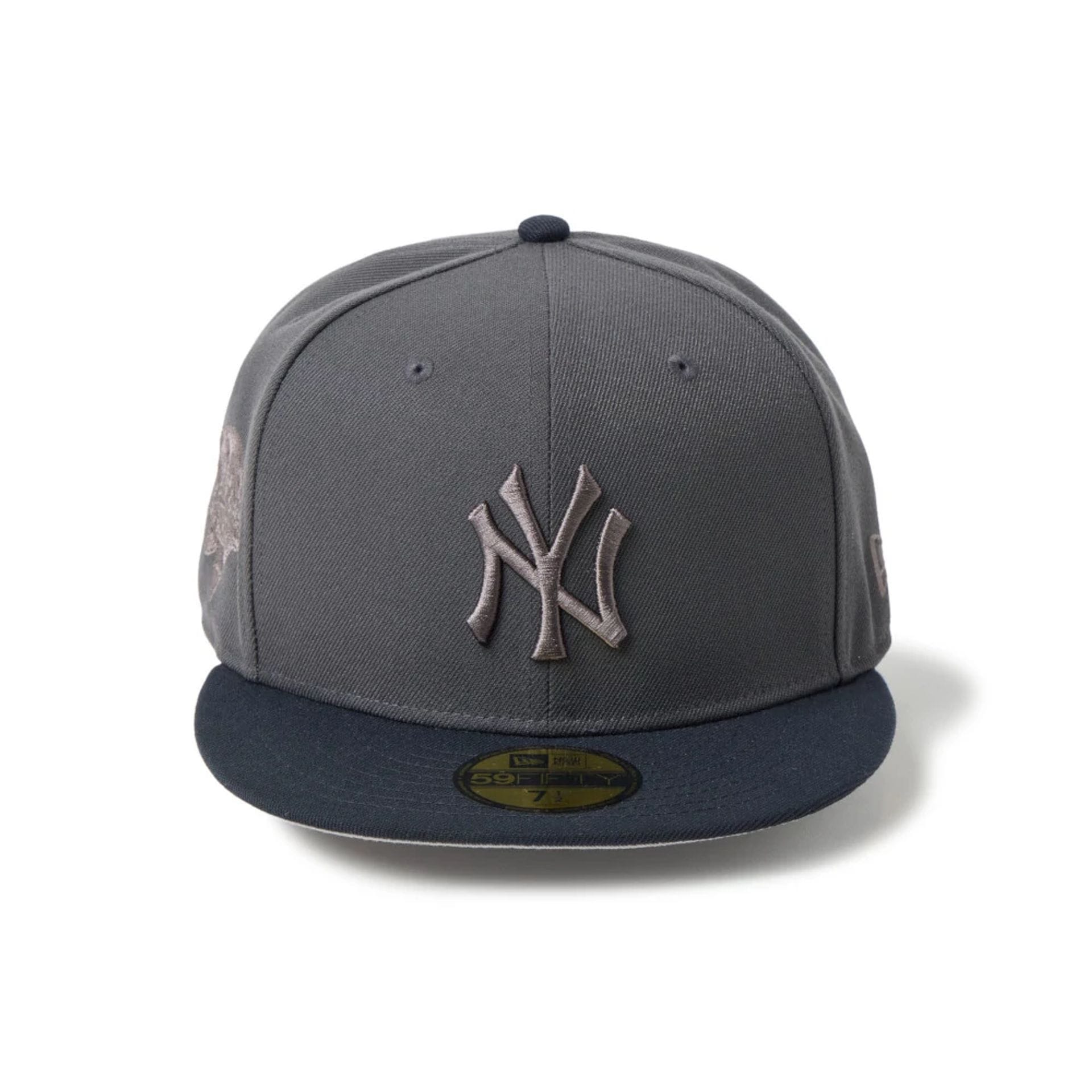 Pictured is this MLB New York Yankees 59FIFTY Fitted cap in dark grey. 2
