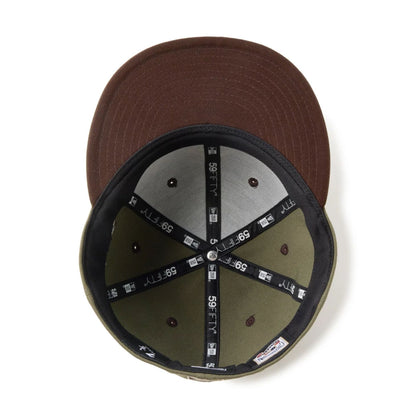 Pictured is this MLB Camo New York Yankees 59FIFTY Fitted cap in green. 9