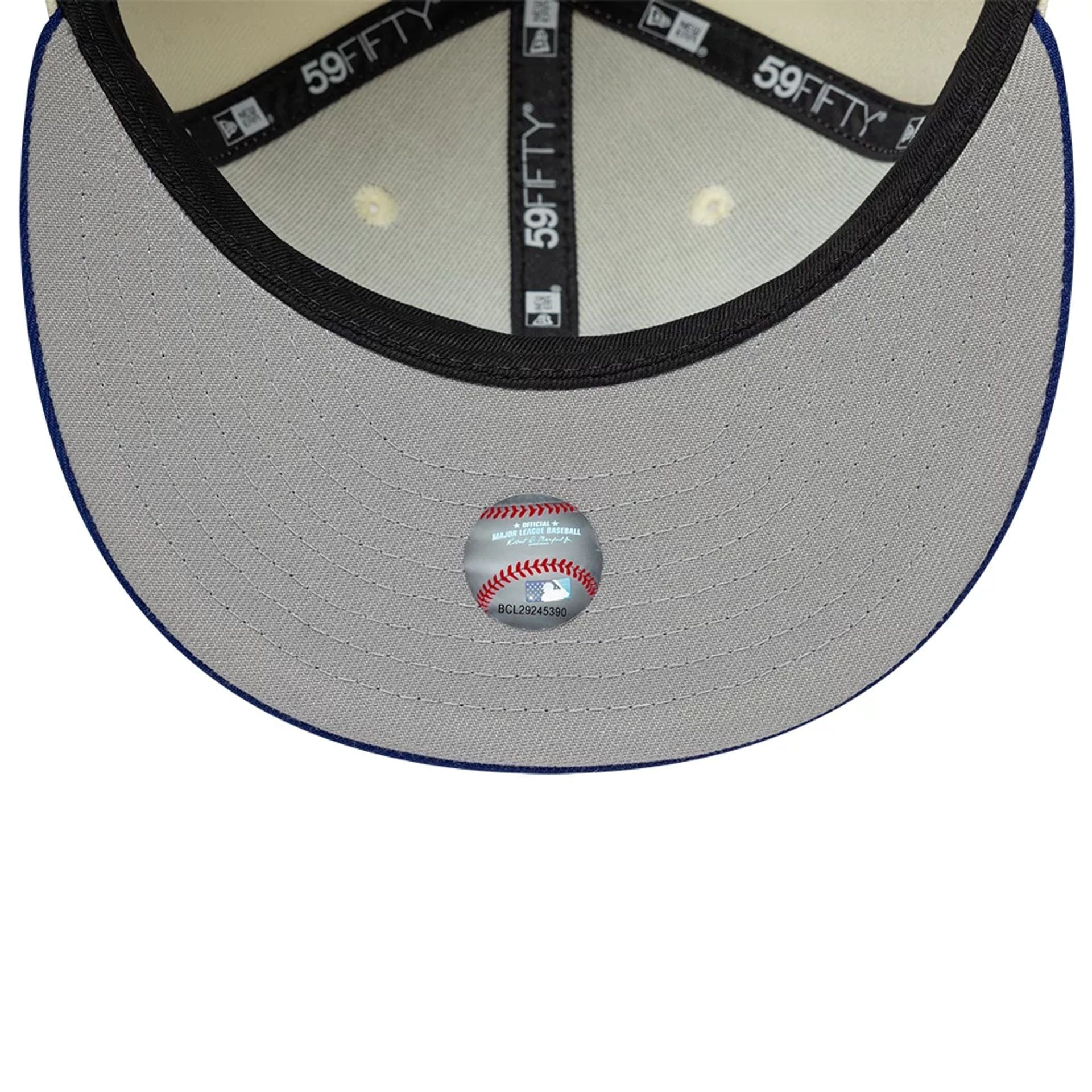 Pictured is this MLB Upside Down LA Dodgers 59FIFTY Fitted cap in cream. 2