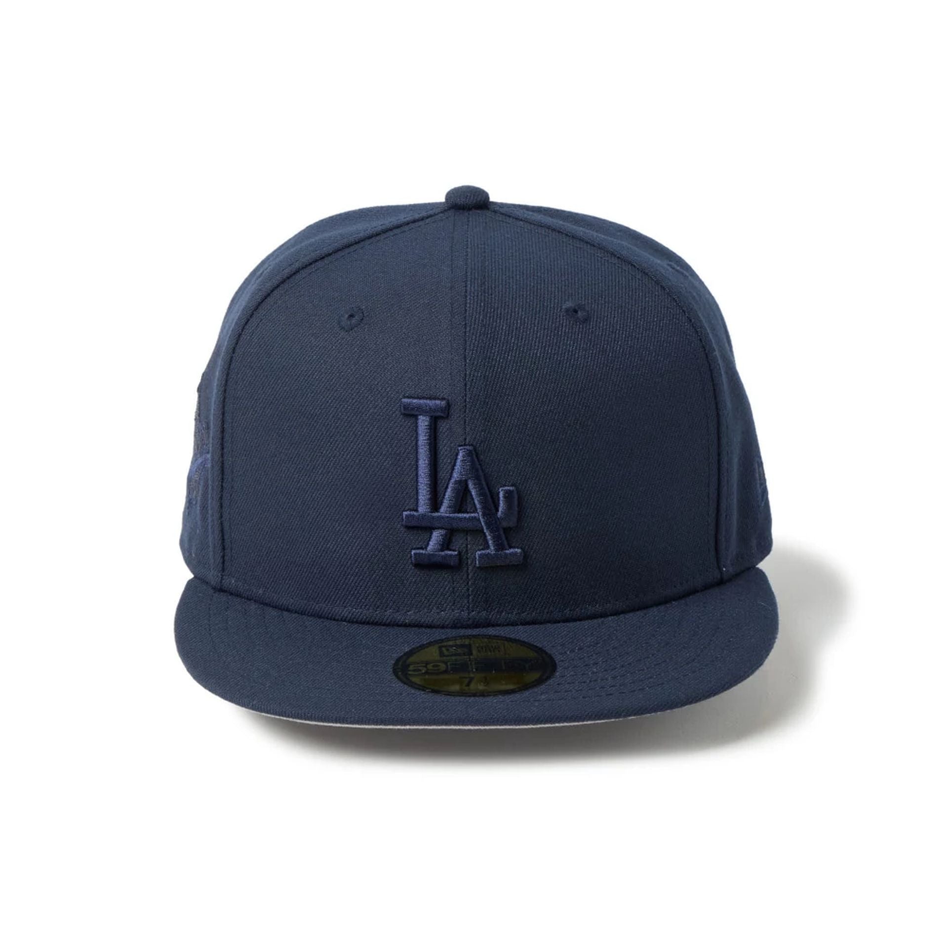 Pictured is this MLB LA Dodgers 59FIFTY Fitted cap in navy. 2