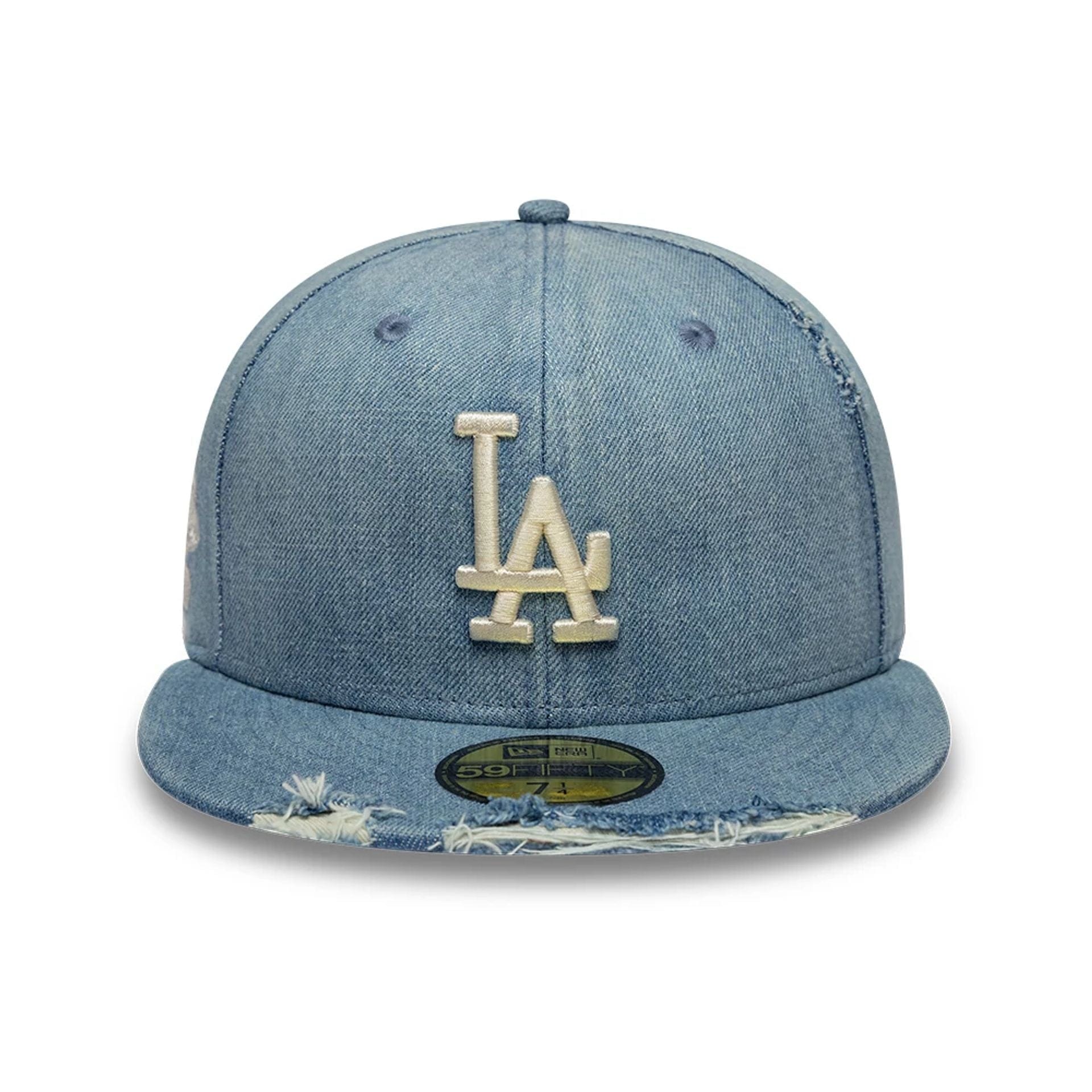 Pictured is this MLB Distressed LA Dodgers 59FIFTY Fitted cap in navy. 2