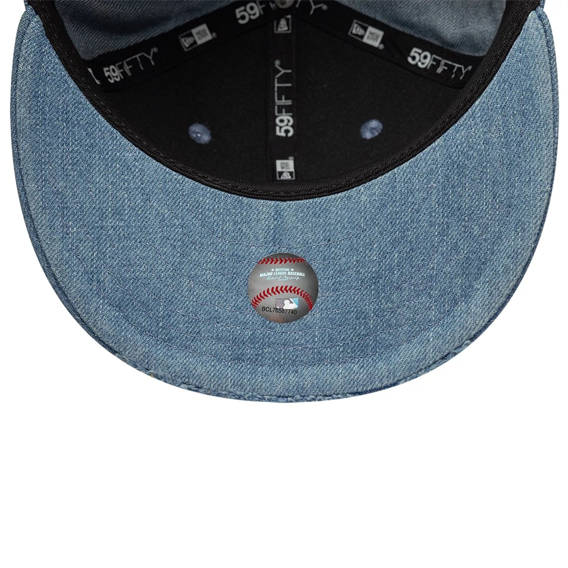 Pictured is this MLB Distressed LA Dodgers 59FIFTY Fitted cap in navy. 7