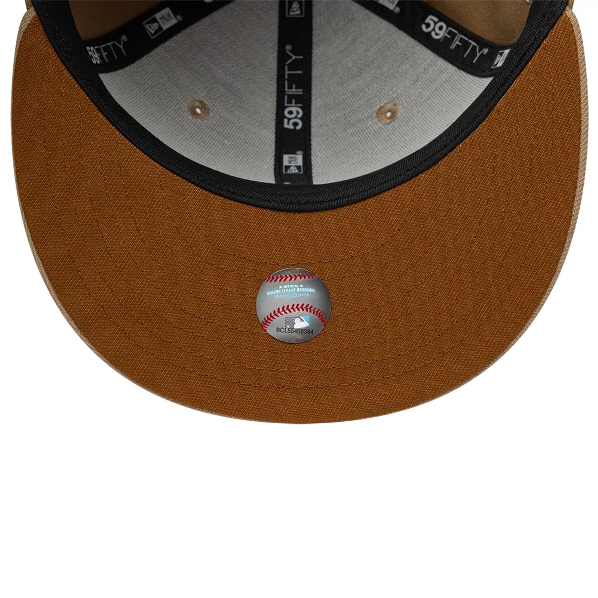 Pictured is this MLB Camo LA Dodgers 59FIFTY Fitted cap in beige. 2