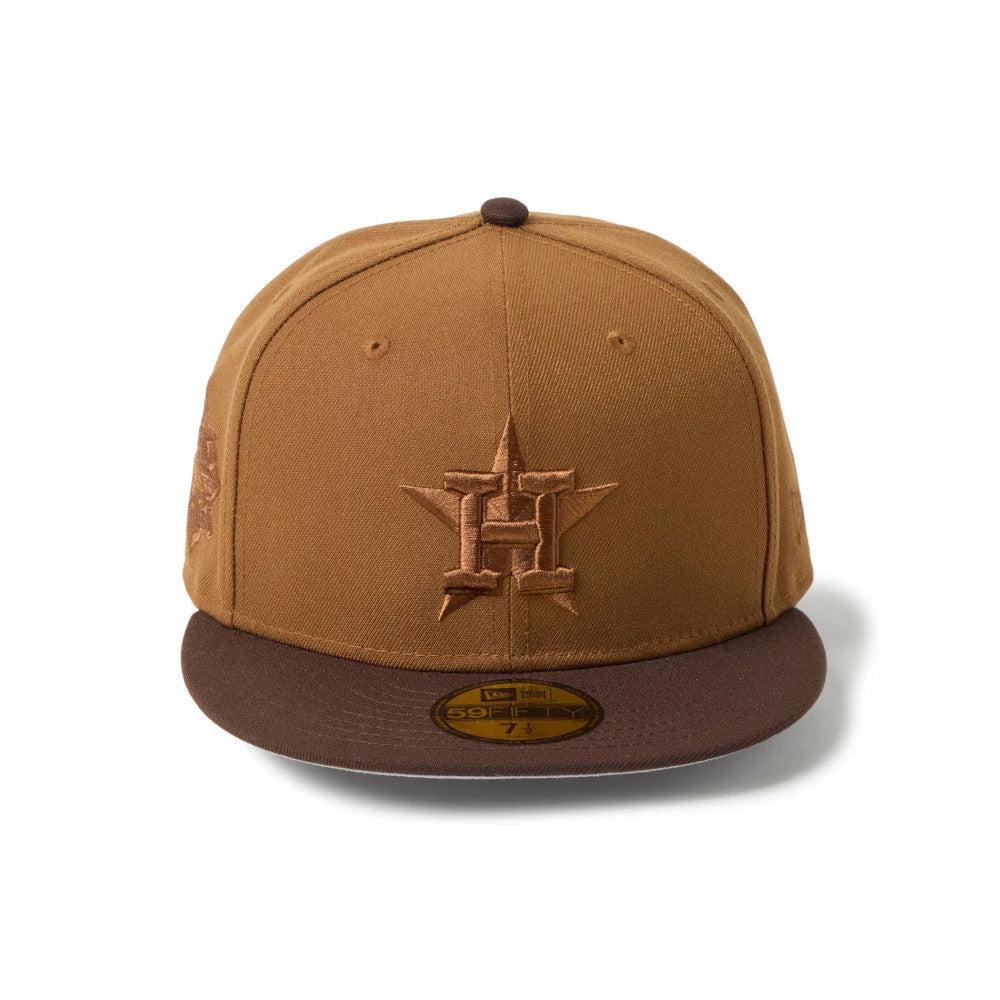 Houston Astros MLB Brown New Era 59FIFTY Fitted Cap, front view showing the brown embroidered H logo with star outline on the front panel, dark brown flat visor with gold 59FIFTY size sticker, and round top button.