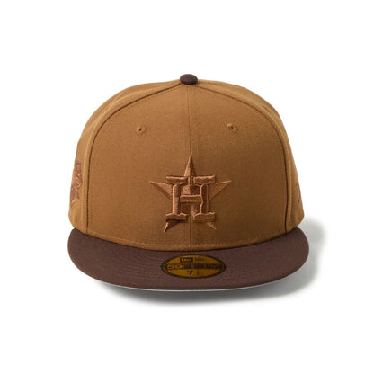 Houston Astros MLB Brown New Era 59FIFTY Fitted Cap, front view showing the brown embroidered H logo with star outline on the front panel, dark brown flat visor with gold 59FIFTY size sticker, and round top button.