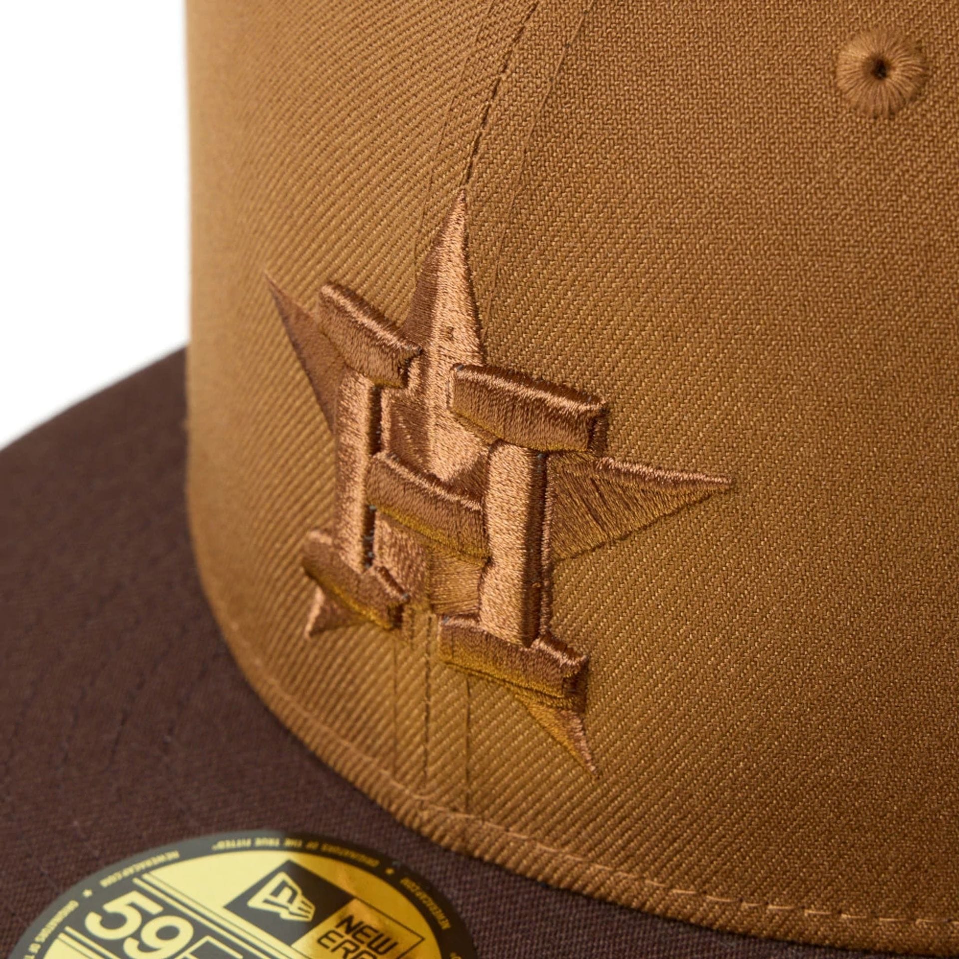 Pictured is this MLB Houston Astros 59FIFTY Fitted cap in Brown. 5