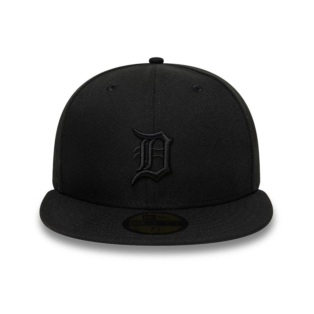 Detroit Tigers MLB Black On Black New Era 59FIFTY Fitted Cap, front view showing a black embroidered D logo on the front panel, with a flat black visor and gold 59FIFTY size sticker on the top of the visor.