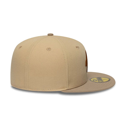 Pictured is this New Era Mocha Mousse 59FIFTY Fitted cap in light beige. 7