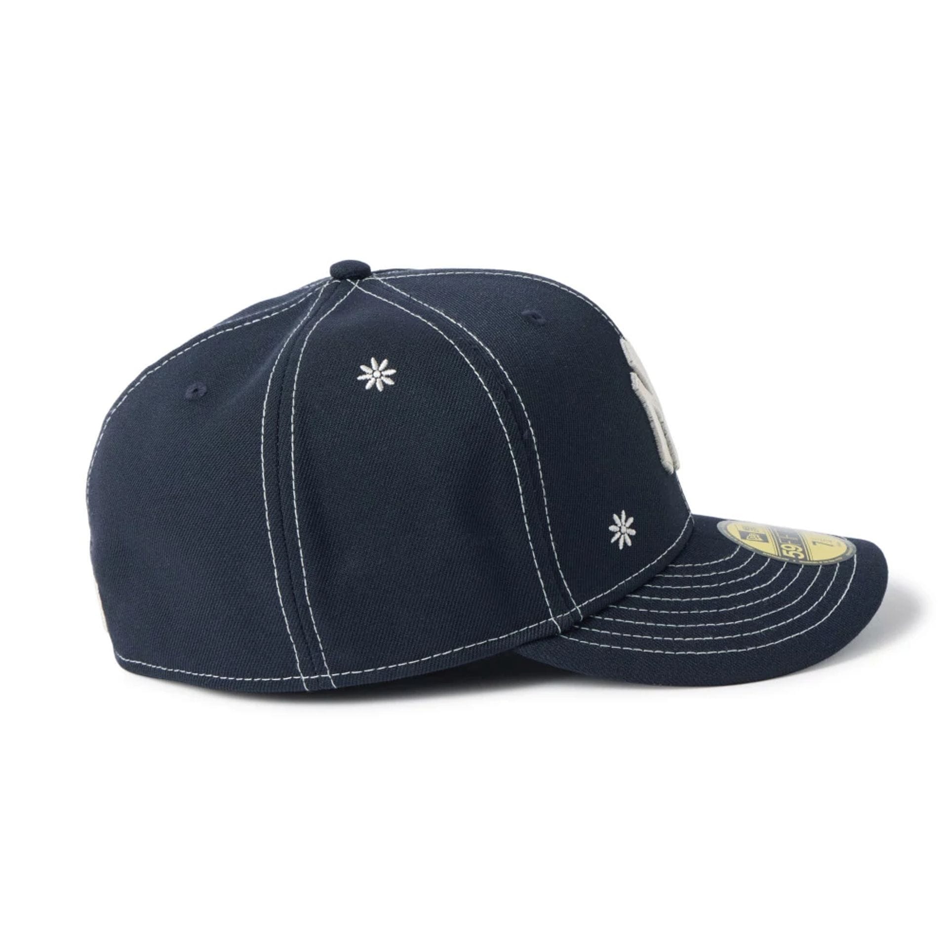 Pictured is this MLB Floral New York Yankees 59FIFTY Fitted cap in navy. 7
