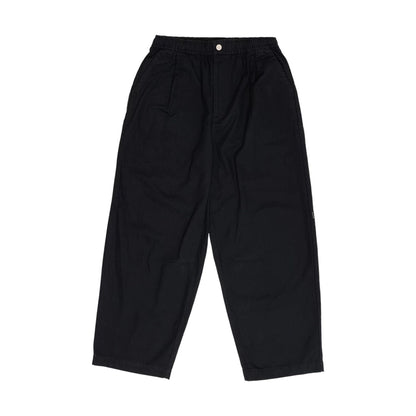 The model is wearing this New Era Balloon Leg Trousers in black. 1