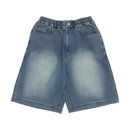 The model is wearing this New Era Washed Bermuda Shorts in blue. 7