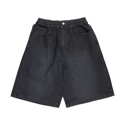 The model is wearing this New Era Washed Bermuda Shorts in black. 1