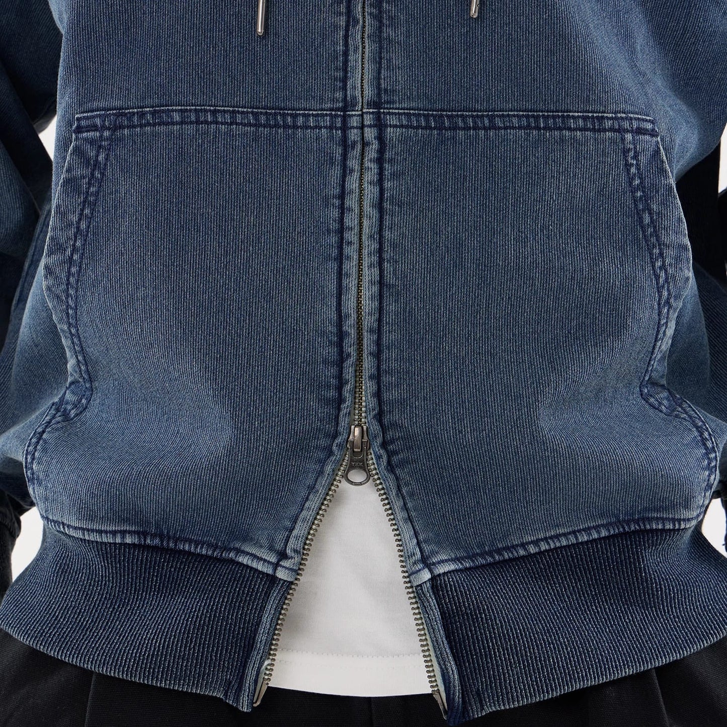 The model is wearing this New Era Washed Full Zip Hoodie in blue. 6