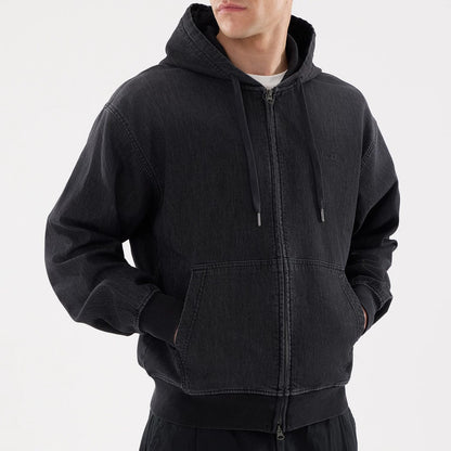 The model is wearing this New Era Washed Full Zip Hoodie in black. 3