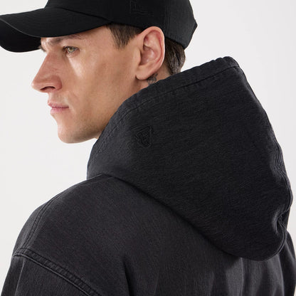 The model is wearing this New Era Washed Full Zip Hoodie in black. 7