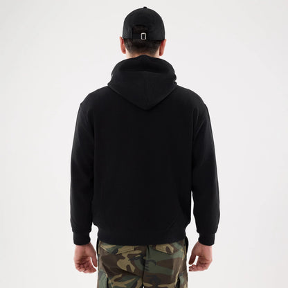 The model is wearing this New Era Waffle Full Zip Hoodie in black. 2