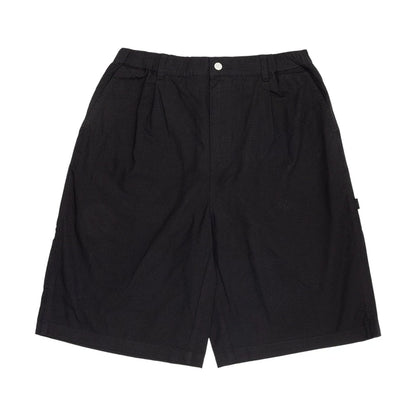 The model is wearing this New Era Canvas Bermuda Shorts in black. 1