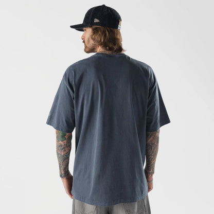The model is wearing this New Era Originators T-Shirt in navy. 2