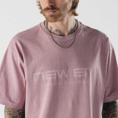 The model is wearing this New Era Originators T-Shirt in pink. 3