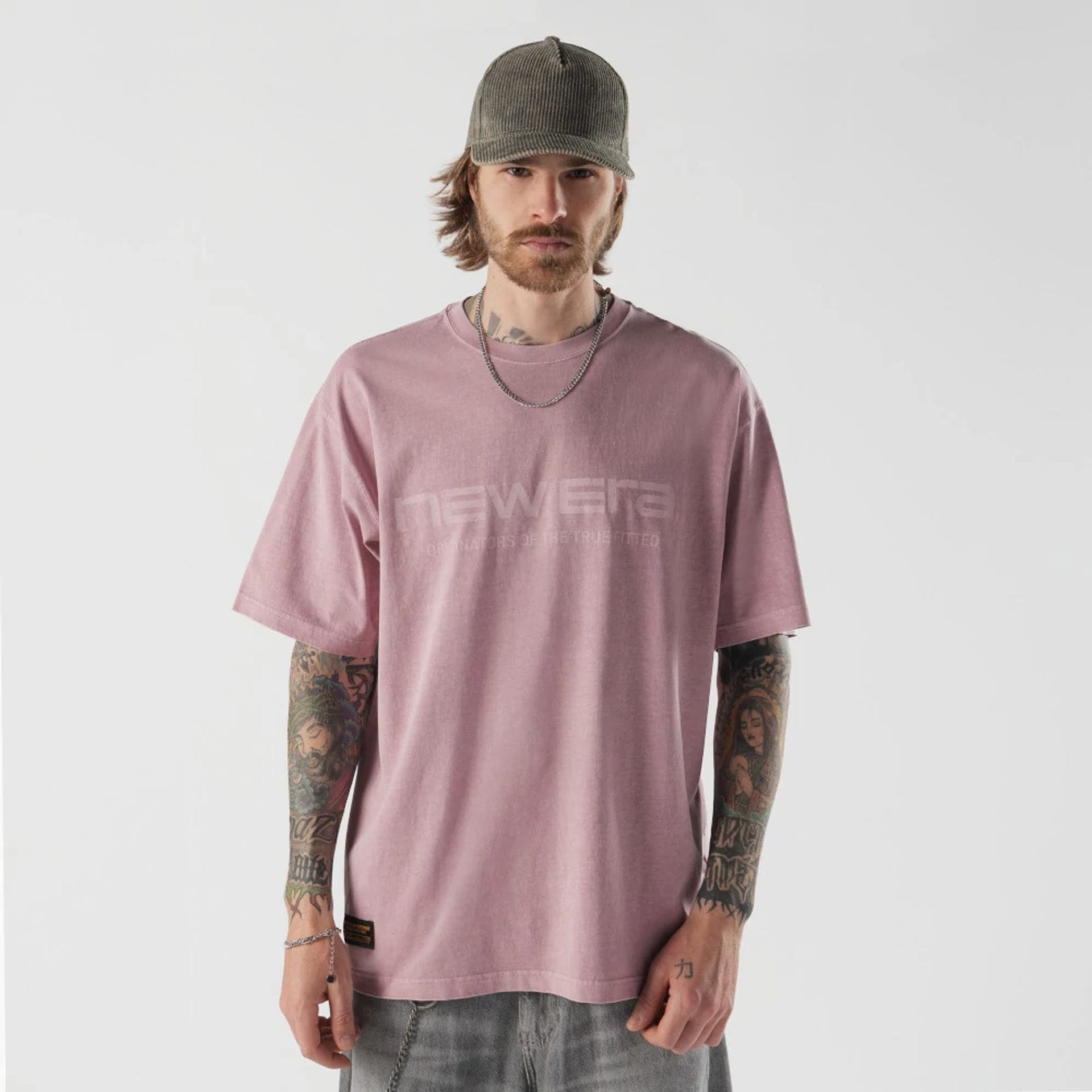 The model is wearing this New Era Originators T-Shirt in pink. 1