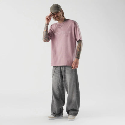 The model is wearing this New Era Originators T-Shirt in pink. 5