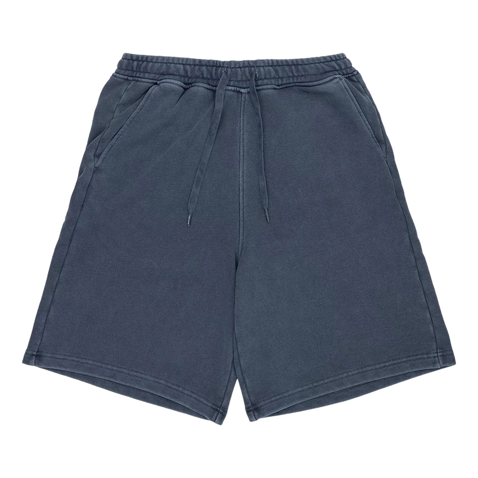 The model is wearing this New Era Originators Oversized Shorts in navy. 1