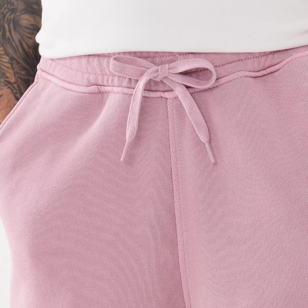 The model is wearing this New Era Originators Oversized Shorts in pink. 5
