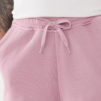 The model is wearing this New Era Originators Oversized Shorts in pink. 5
