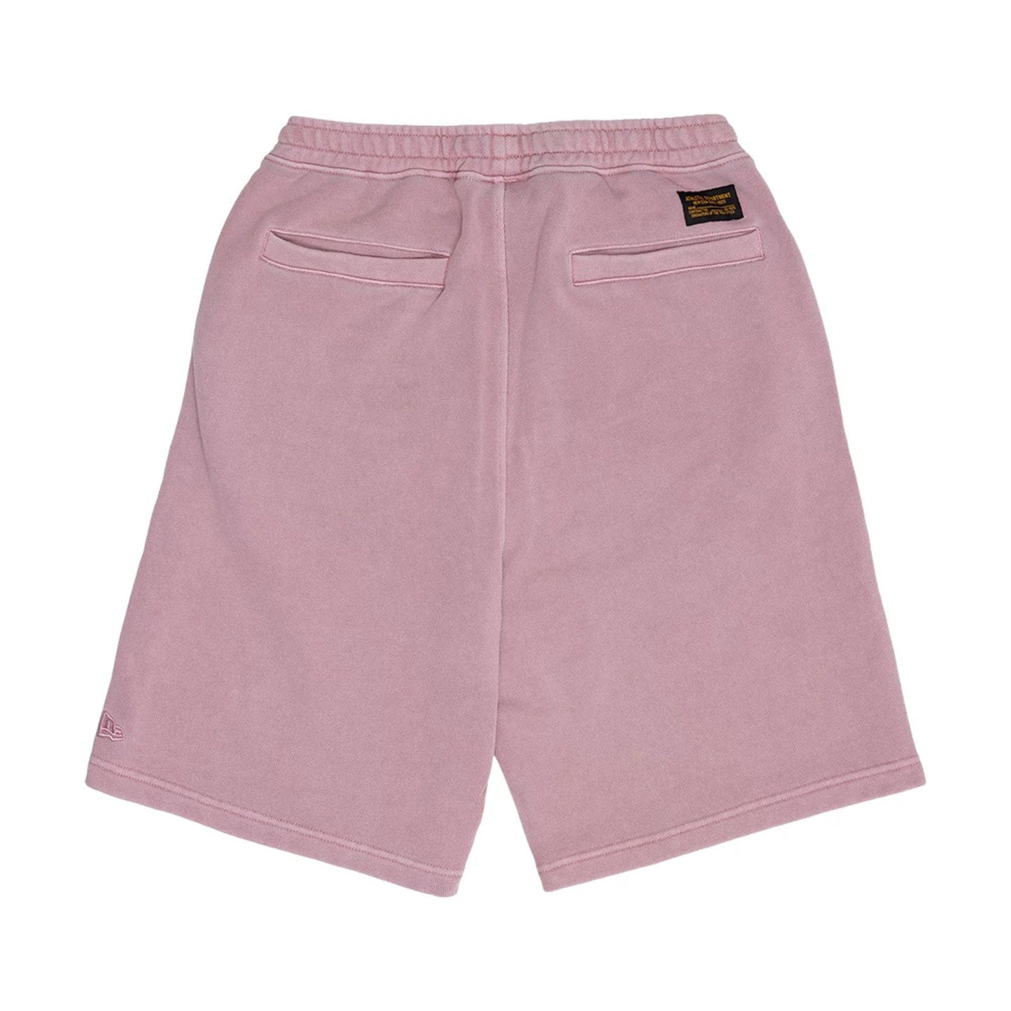 The model is wearing this New Era Originators Oversized Shorts in pink. 9
