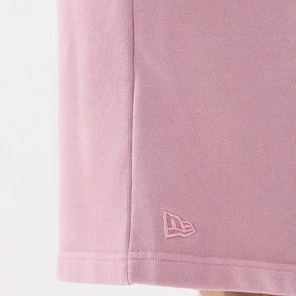 The model is wearing this New Era Originators Oversized Shorts in pink. 6